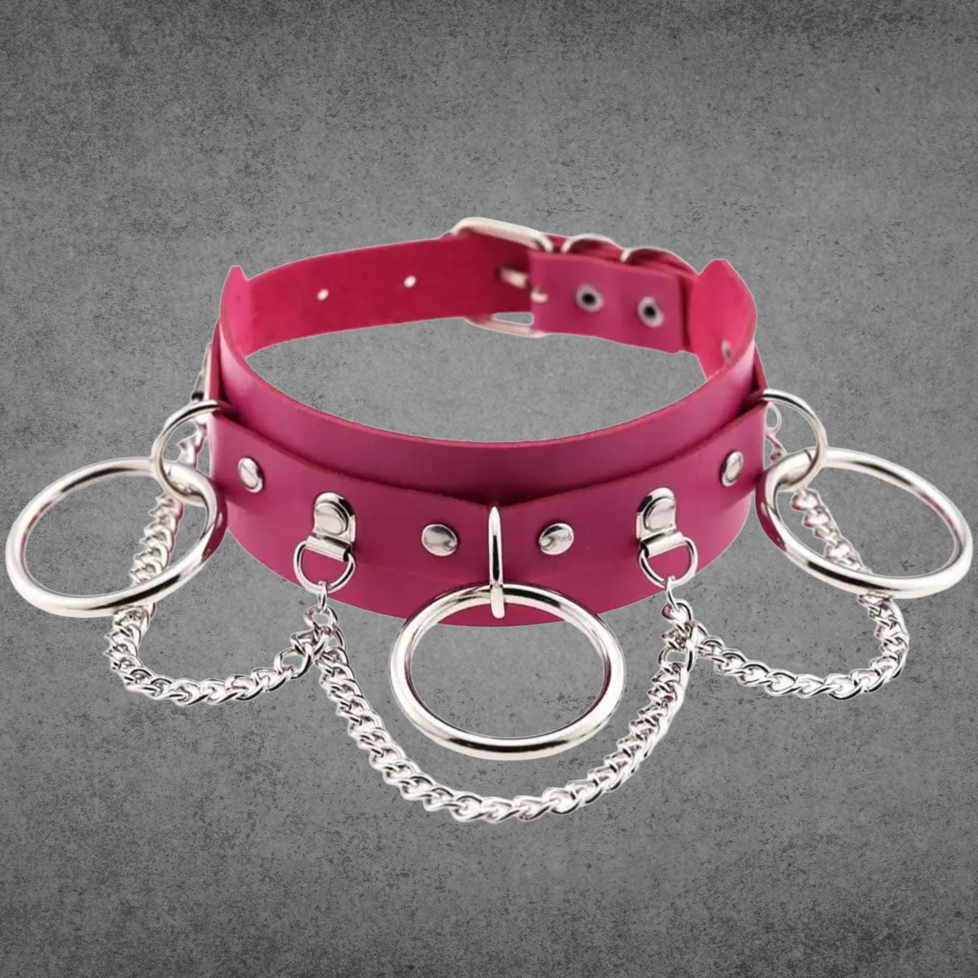 Hot pink faux leather collar with three silver O-rings and chain detail