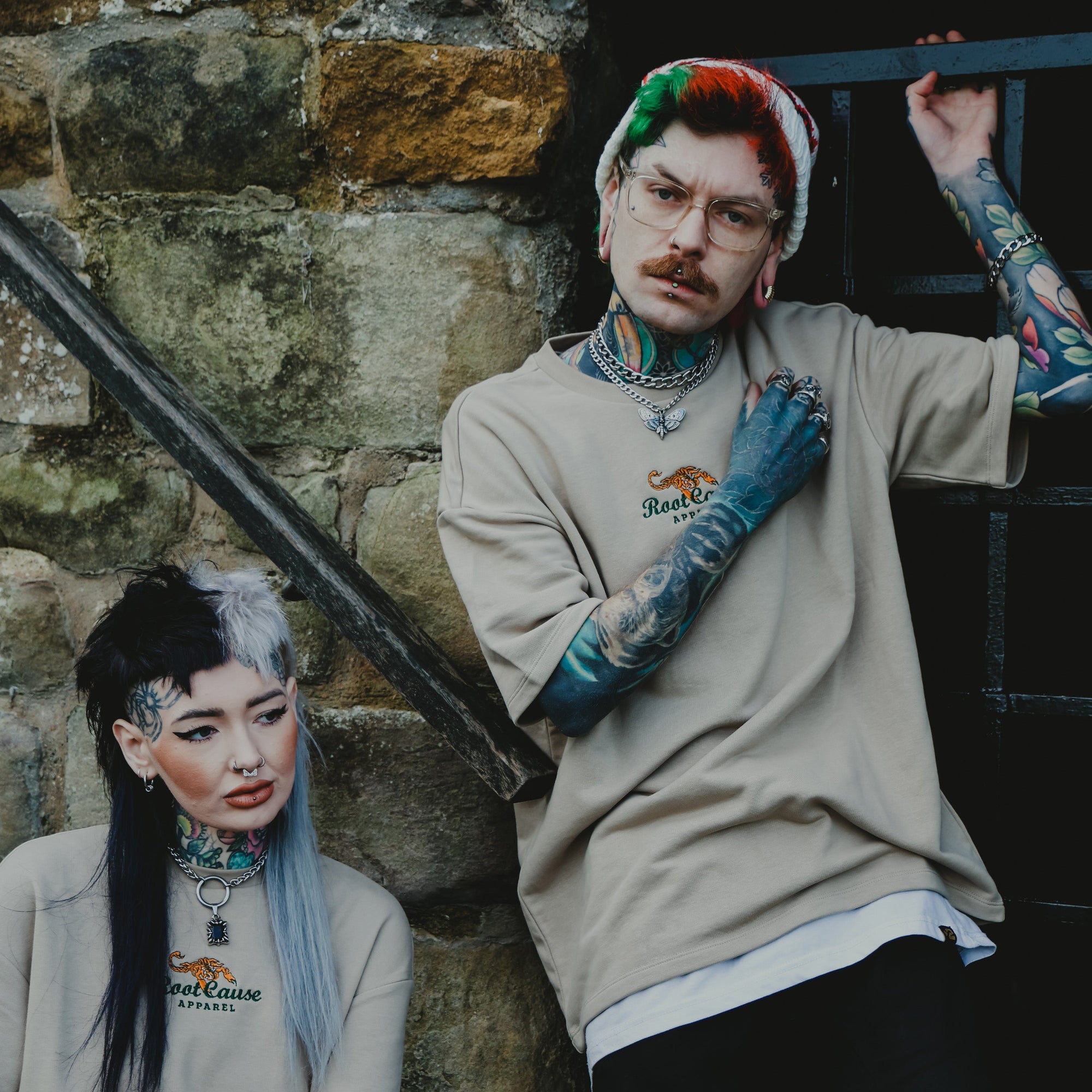 Man wearing a Death Moth Choker with layered silver chunky cuban link choker necklace