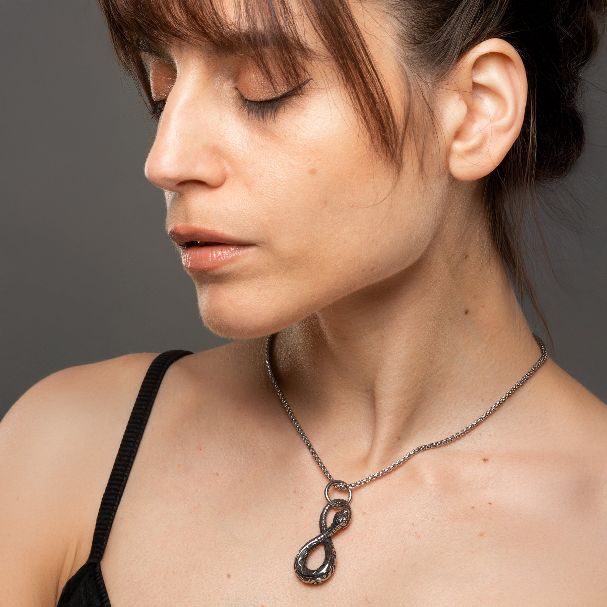 snake pendant on a dainty box chain necklace