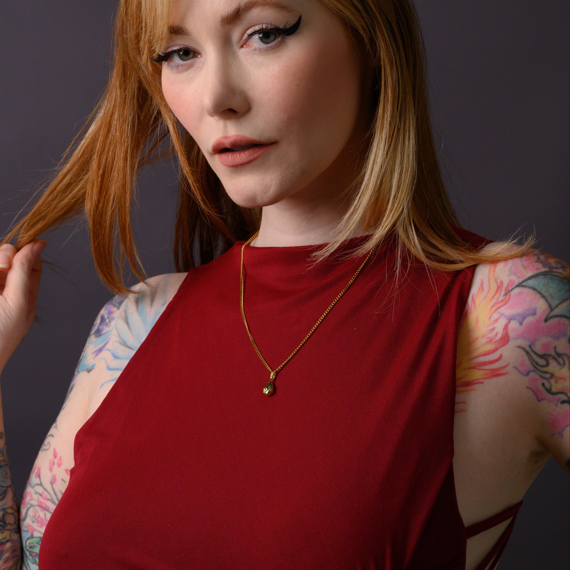 Gold Peridot Birthstone pendant necklace on dainty cuban chain