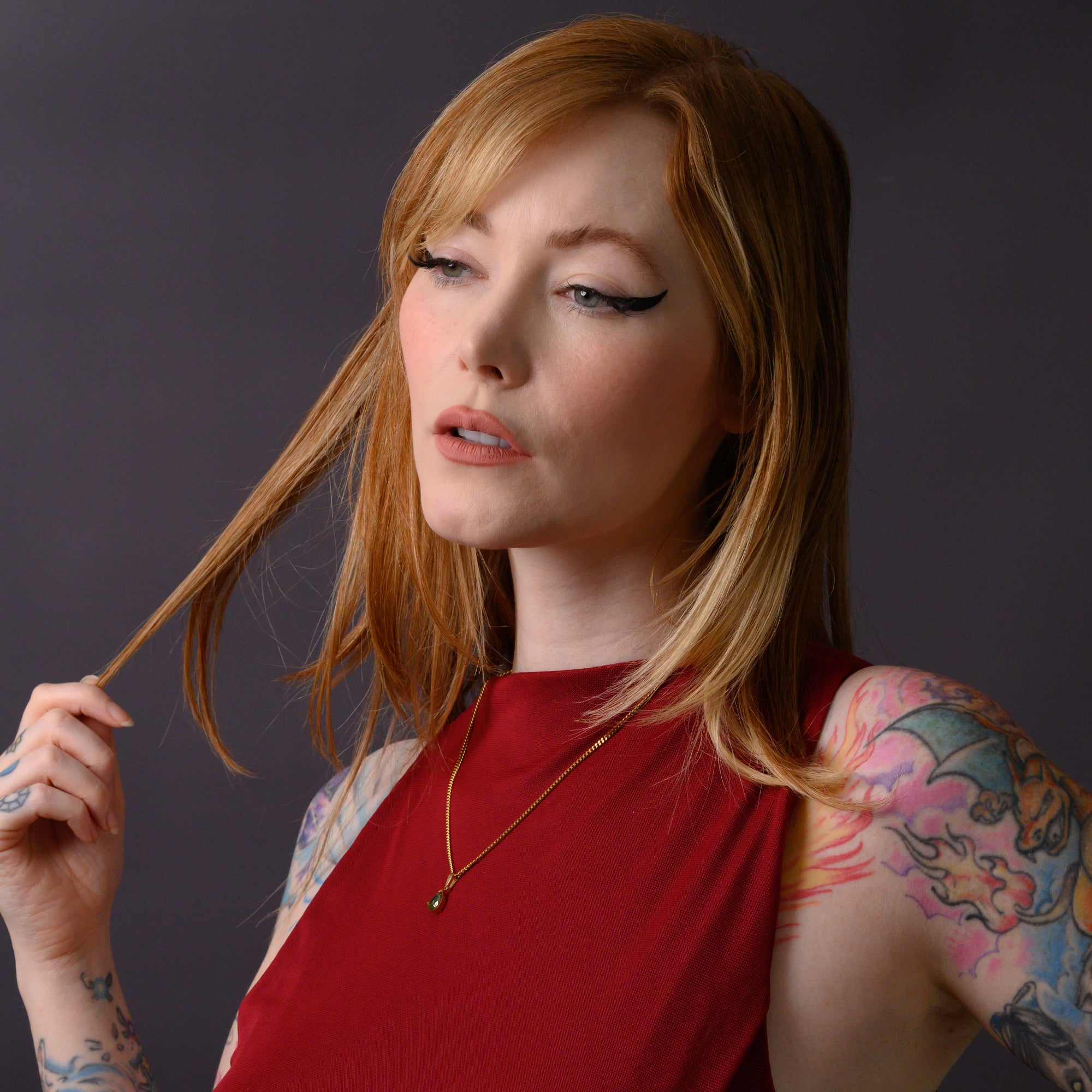 Gold Peridot Birthstone pendant necklace on dainty cuban chain