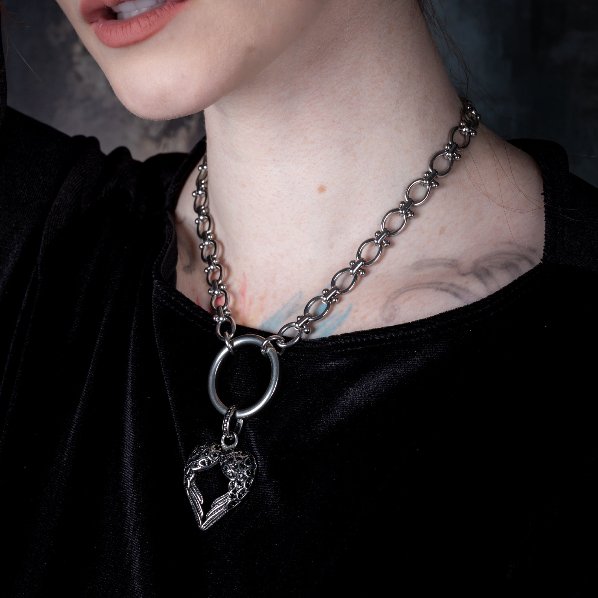 Raven wing o ring choker necklace in silver with black cubic zirconia stones