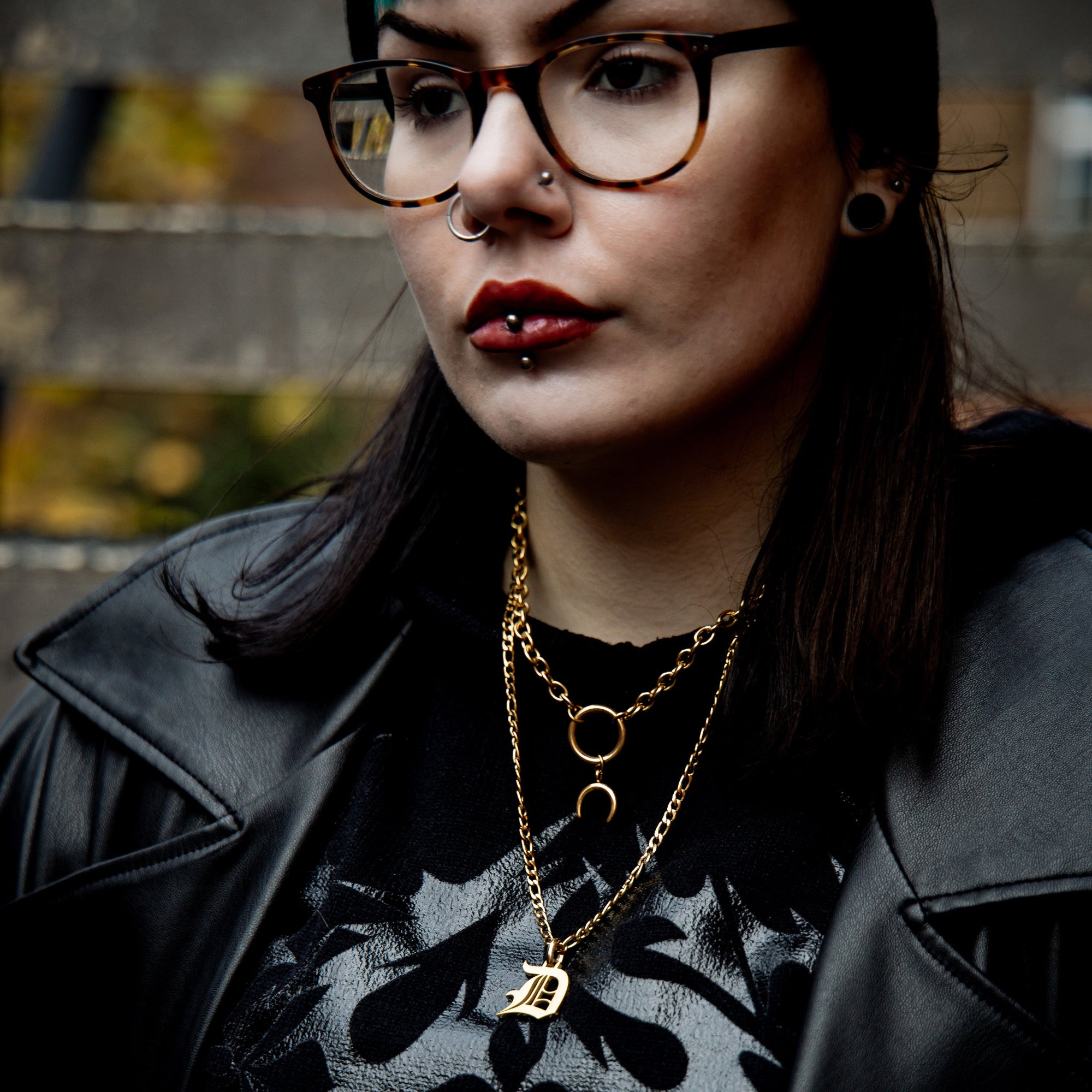 Gold Oversized initial necklace layered with a Gold crescent moon o ring choker