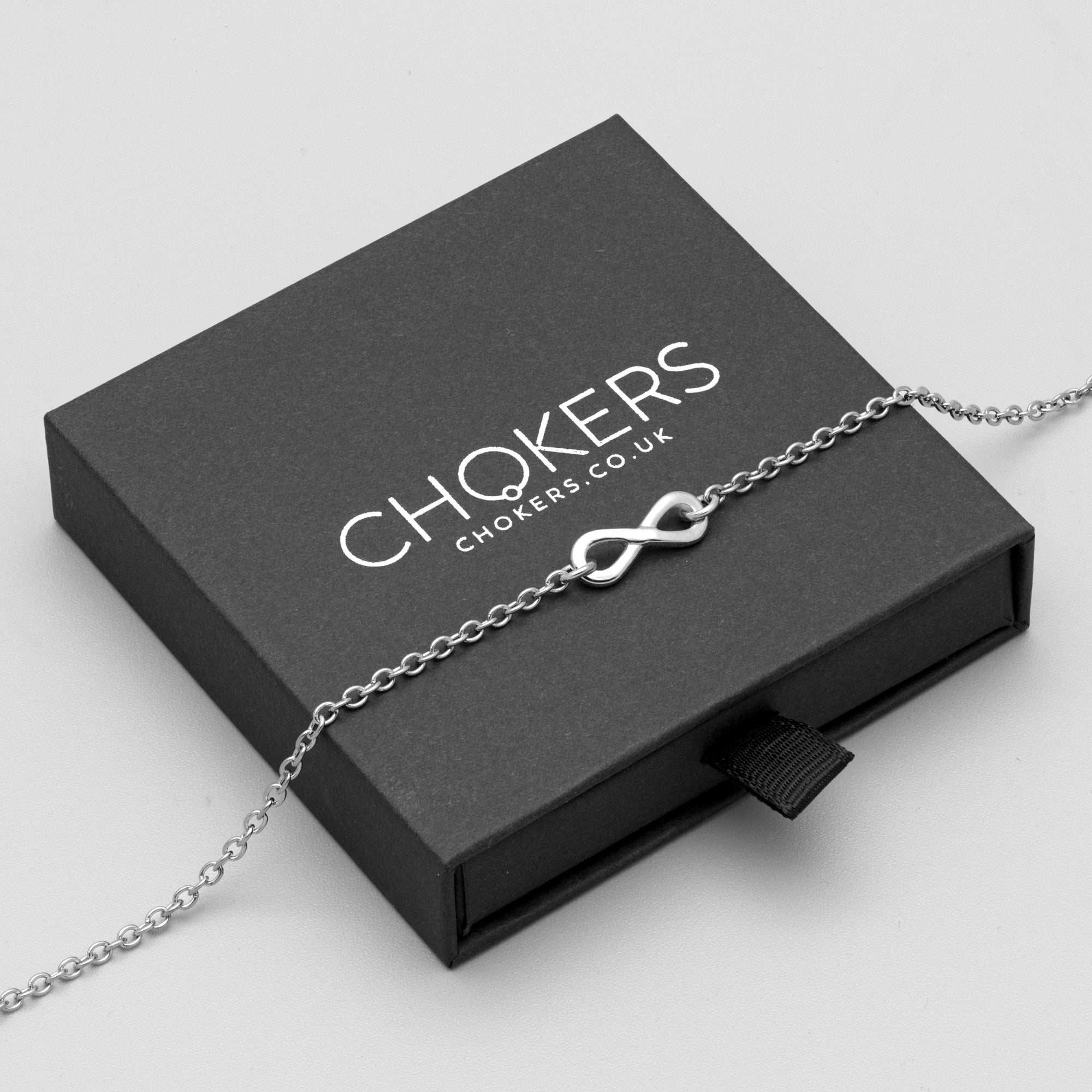 silver infinity symbol day collar choker on a dainty cable chain