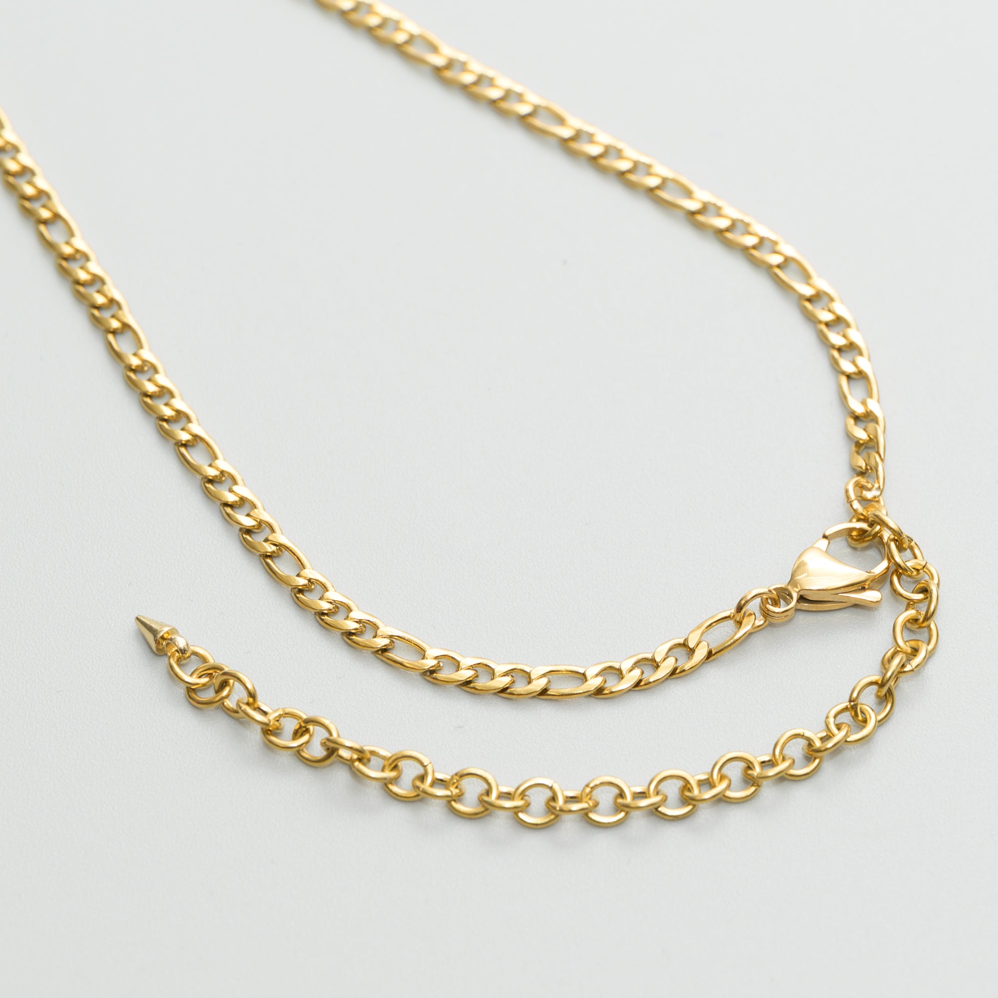 Gold slip chain necklace with a heart-shaped pendant made from 18k Gold plated stainless steel
