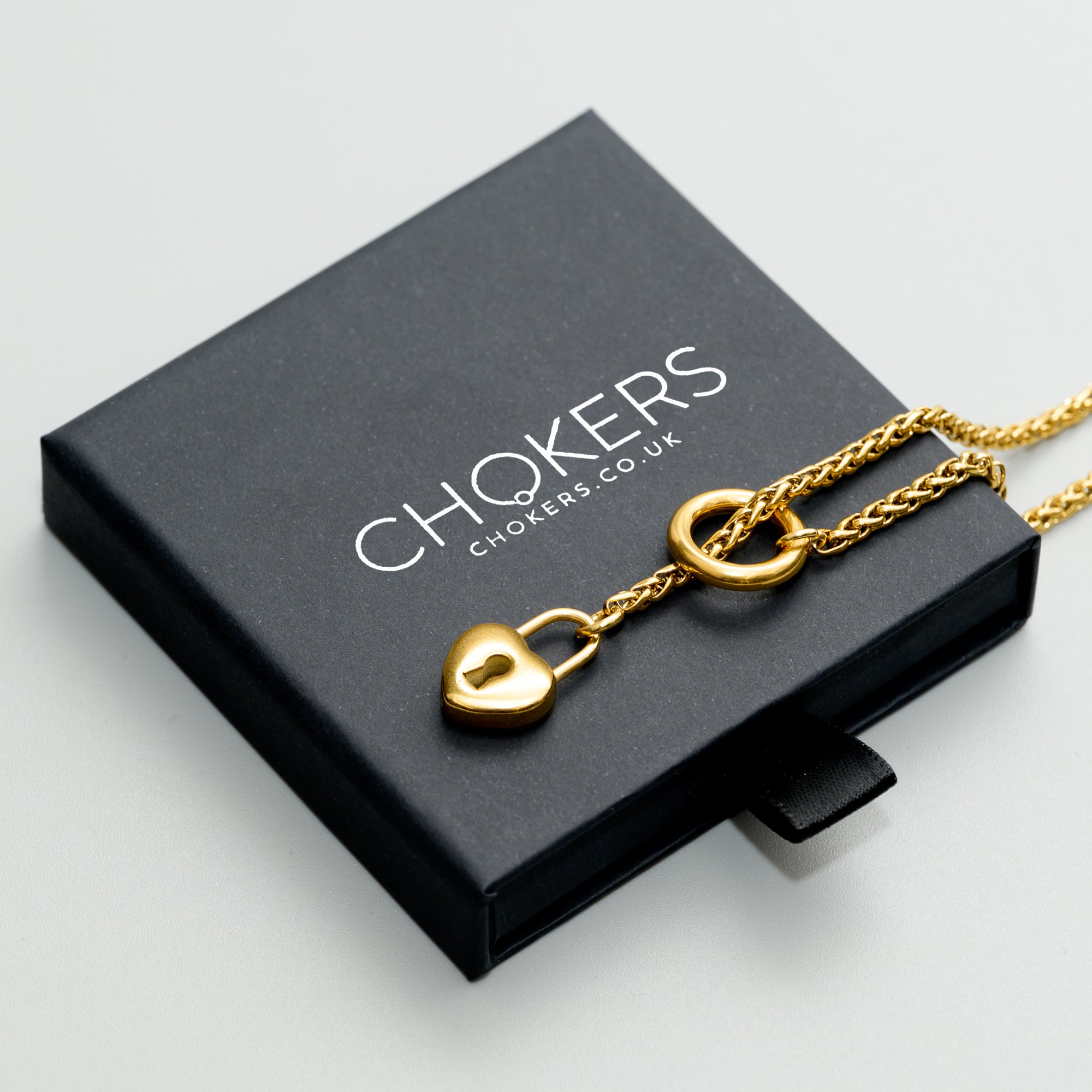 Gold slip chain necklace with a heart lock pendant made from full 18k Gold plated stainless steel