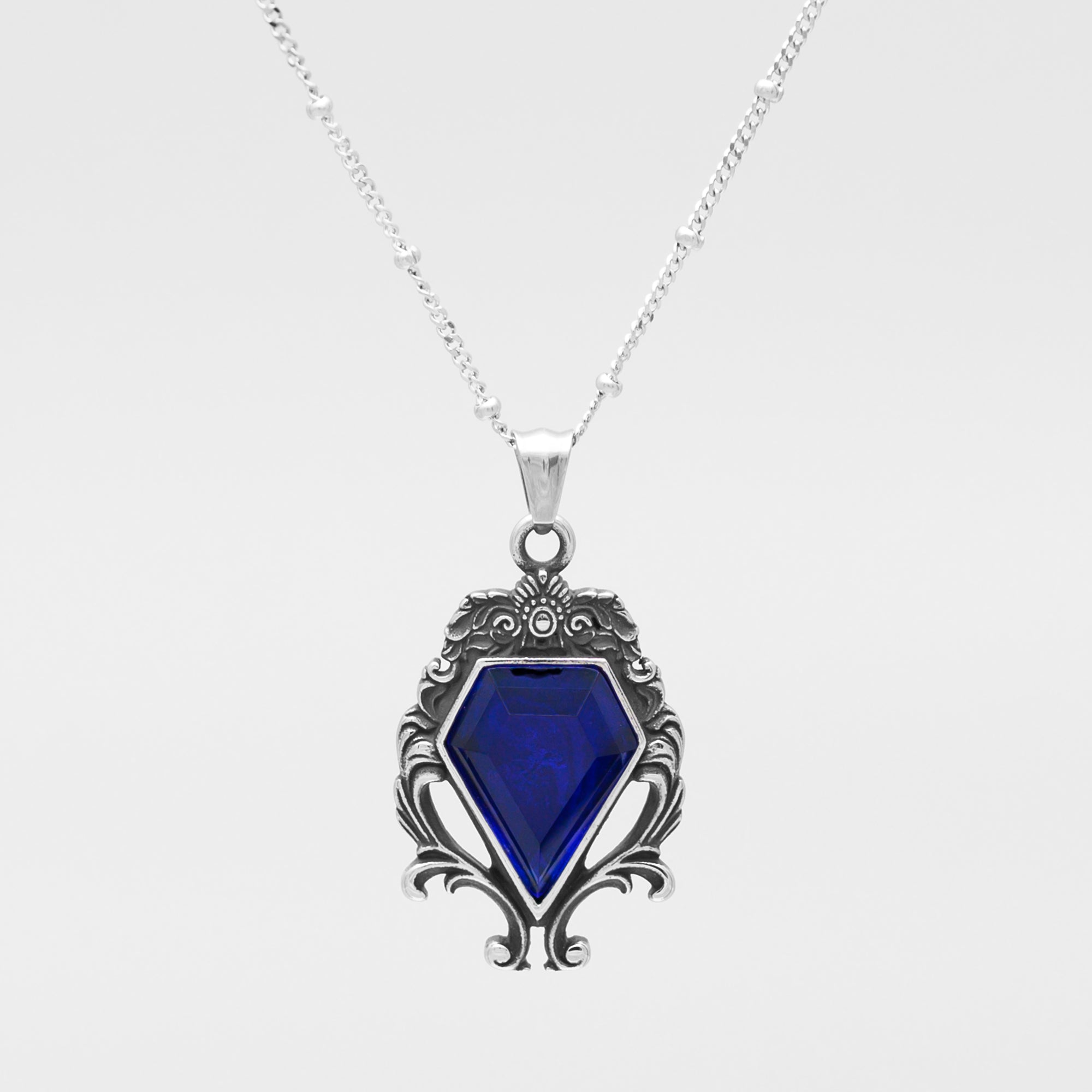 cobalt blue gemstone gothic style pendant on silver satellite chain