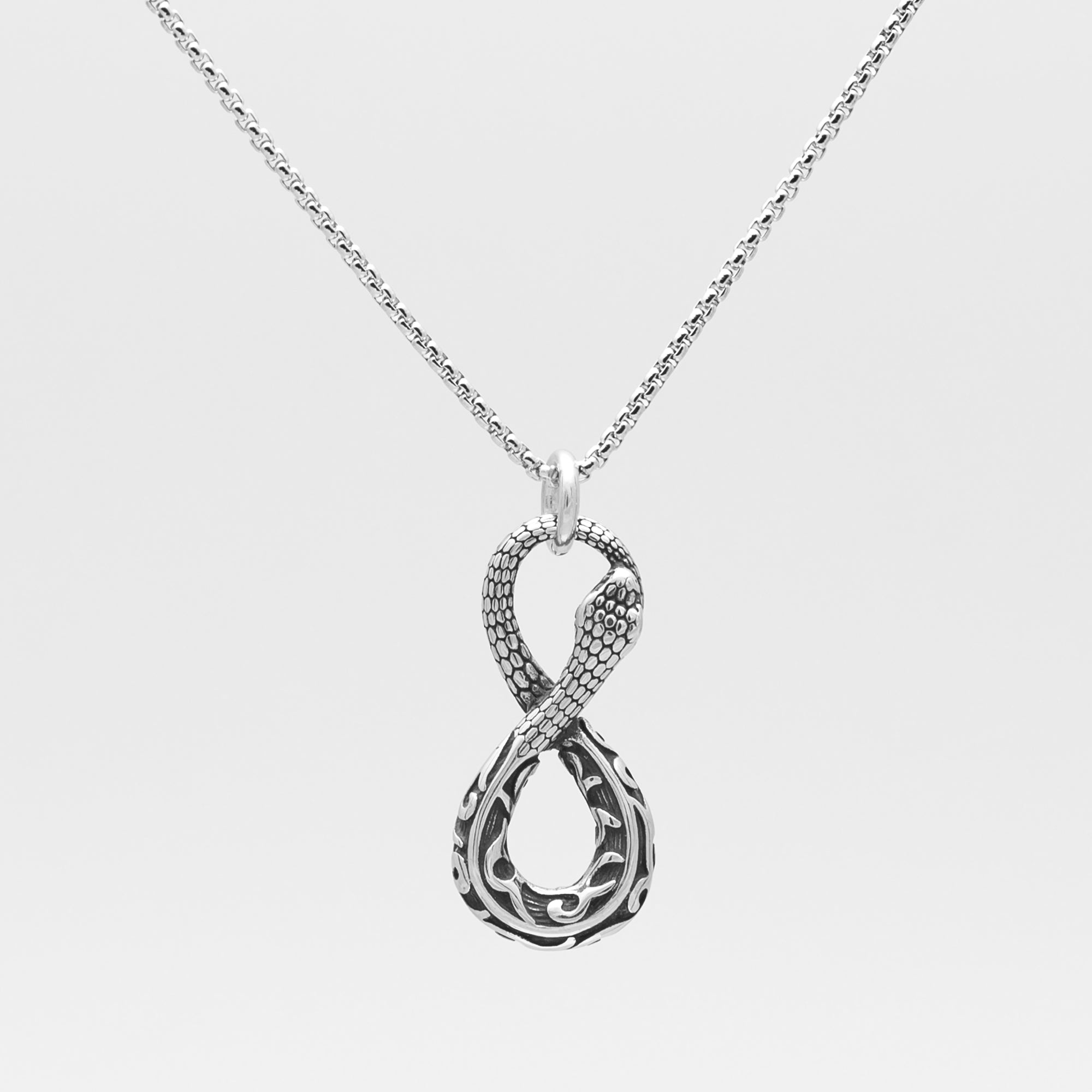 snake pendant on a dainty box chain necklace