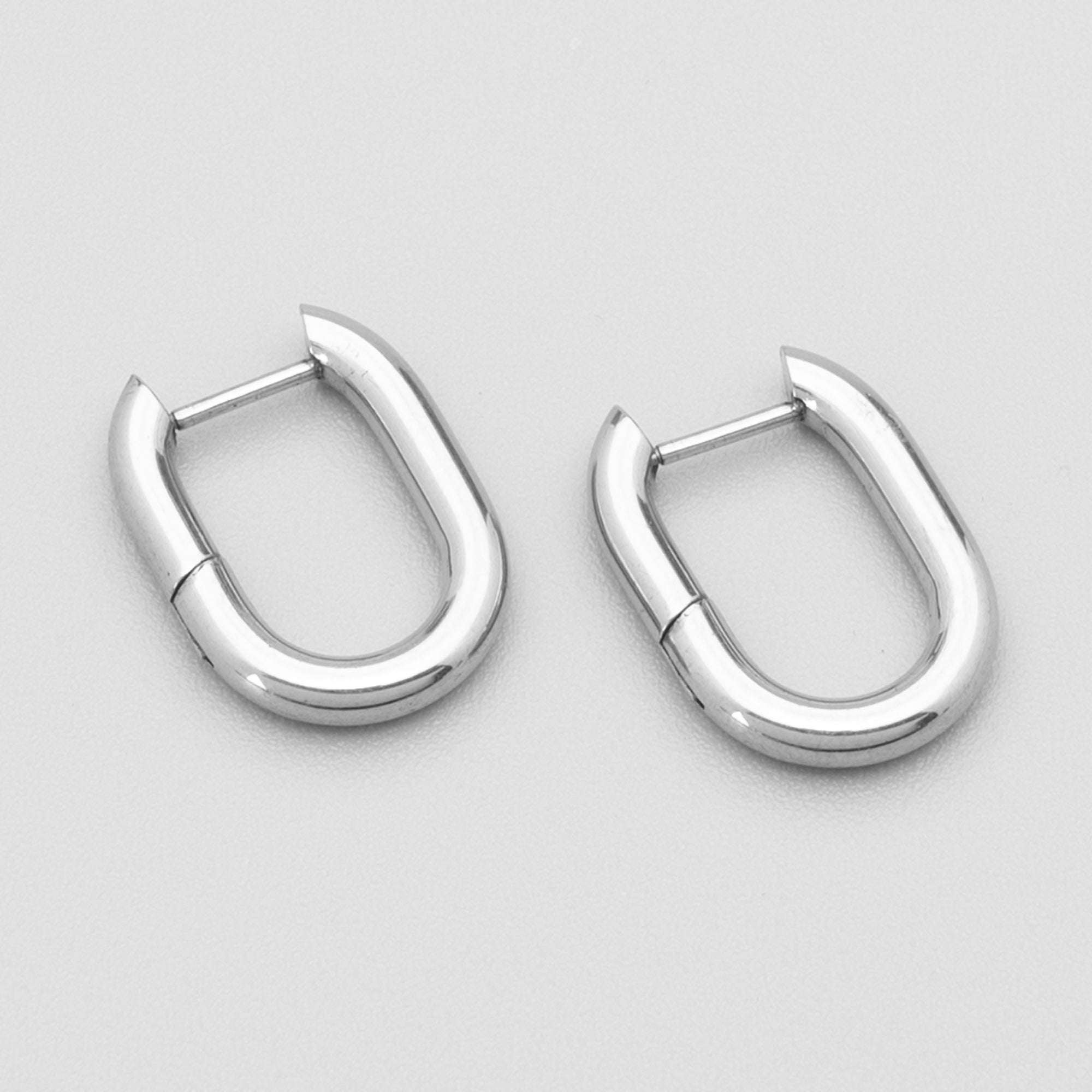 Silver oval hinged huggie hoop earrings