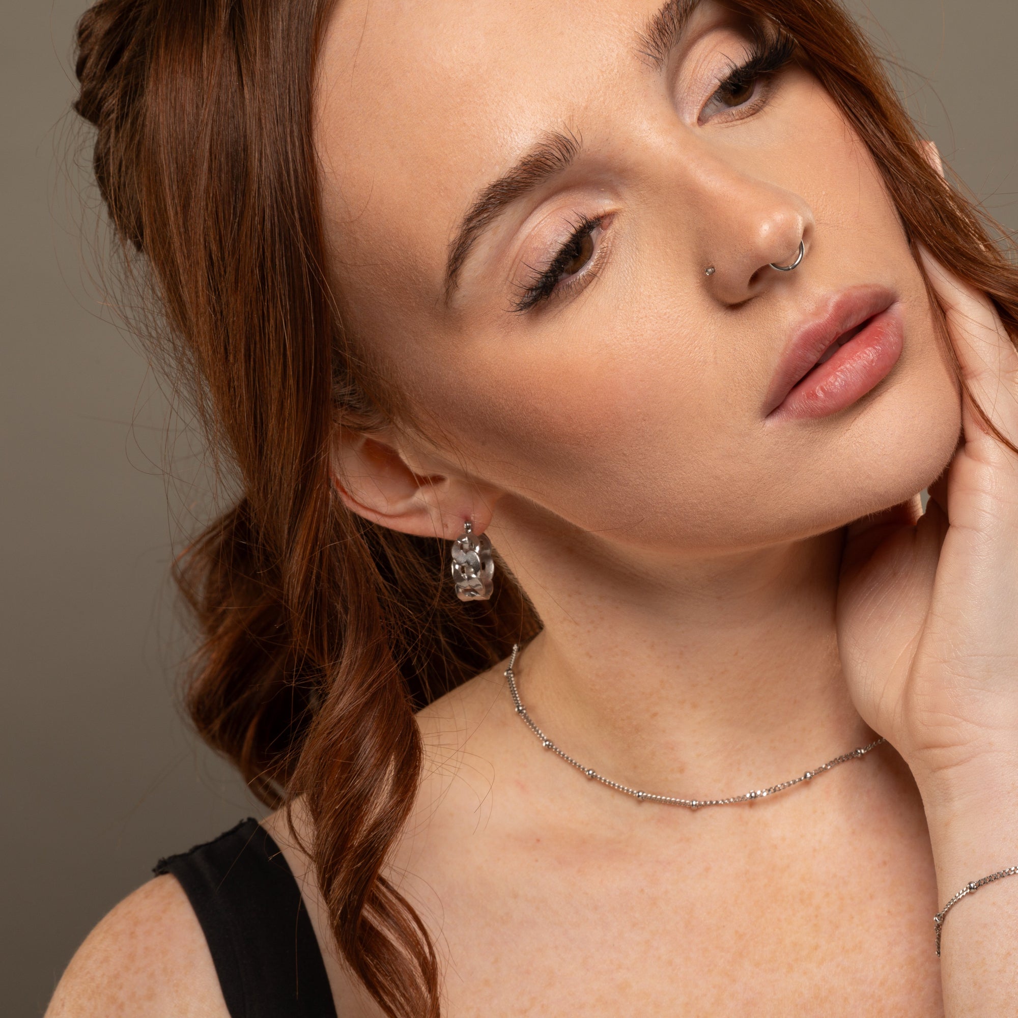 silver cuban link hoop earrings paired with cuban link satellite choker chain