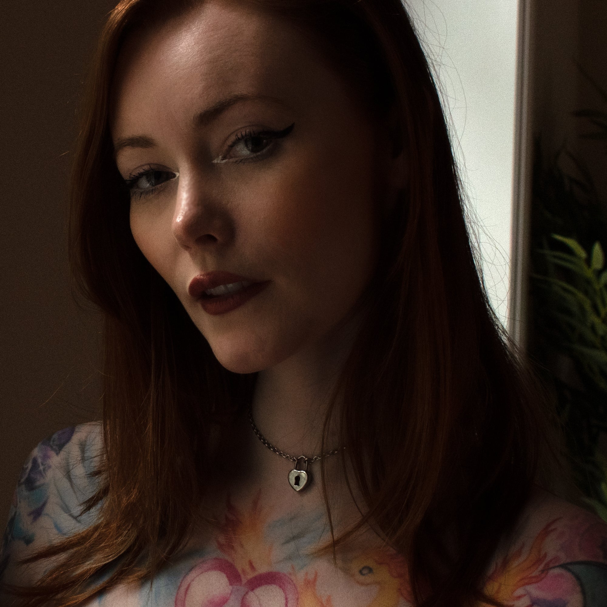 Day Collar with heart padlock pendant on model