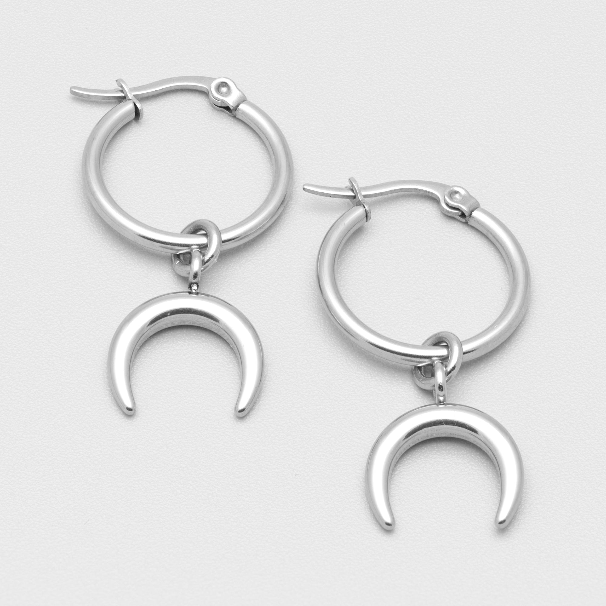 Non tarnish Crescent moon hoop earrings in silver
