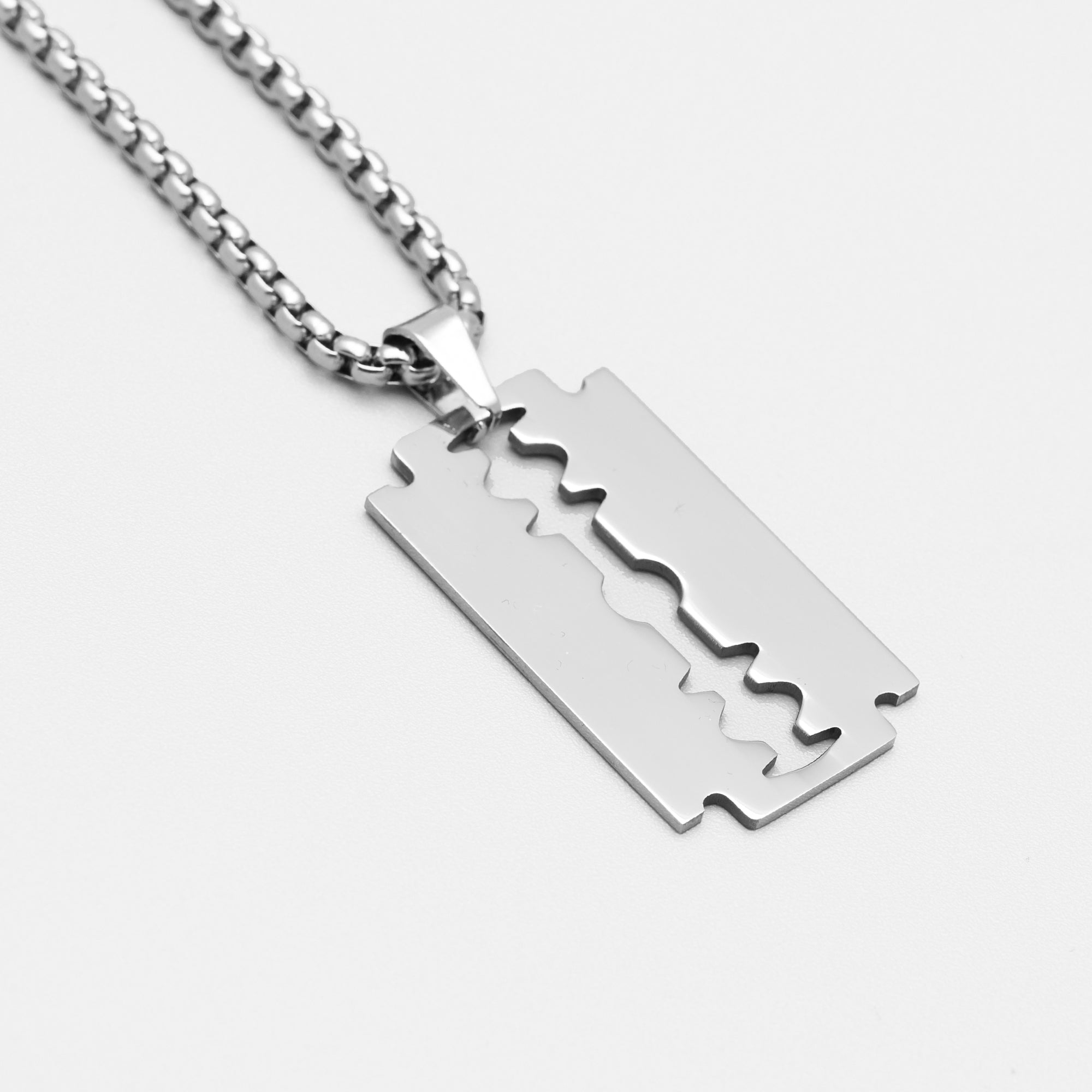 extra large razor blade pendant choker in silver on a chunky box chain necklace