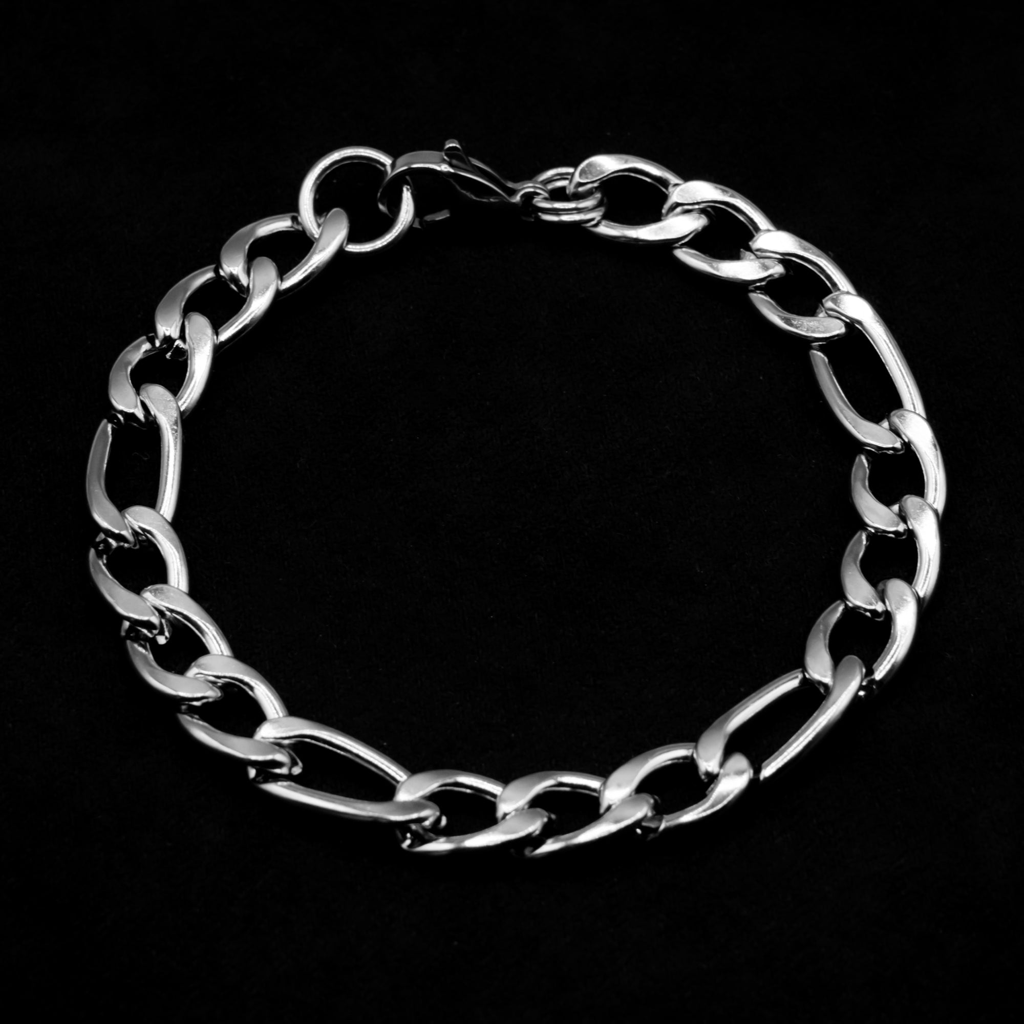 Close up of figaro chain bracelet 