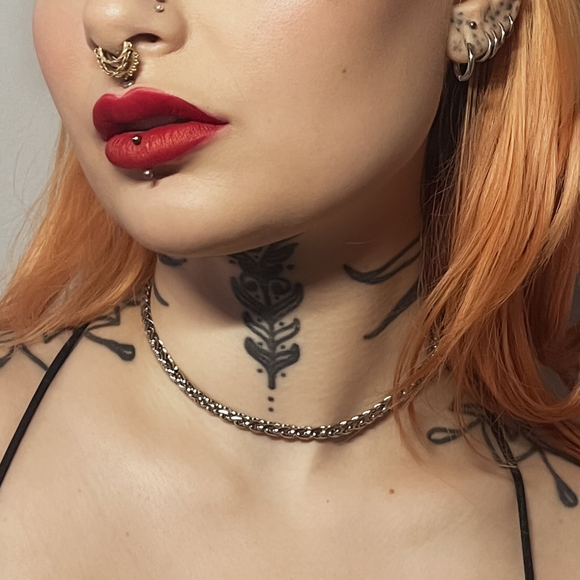 Model wears silver 5mm foxtail choker chain