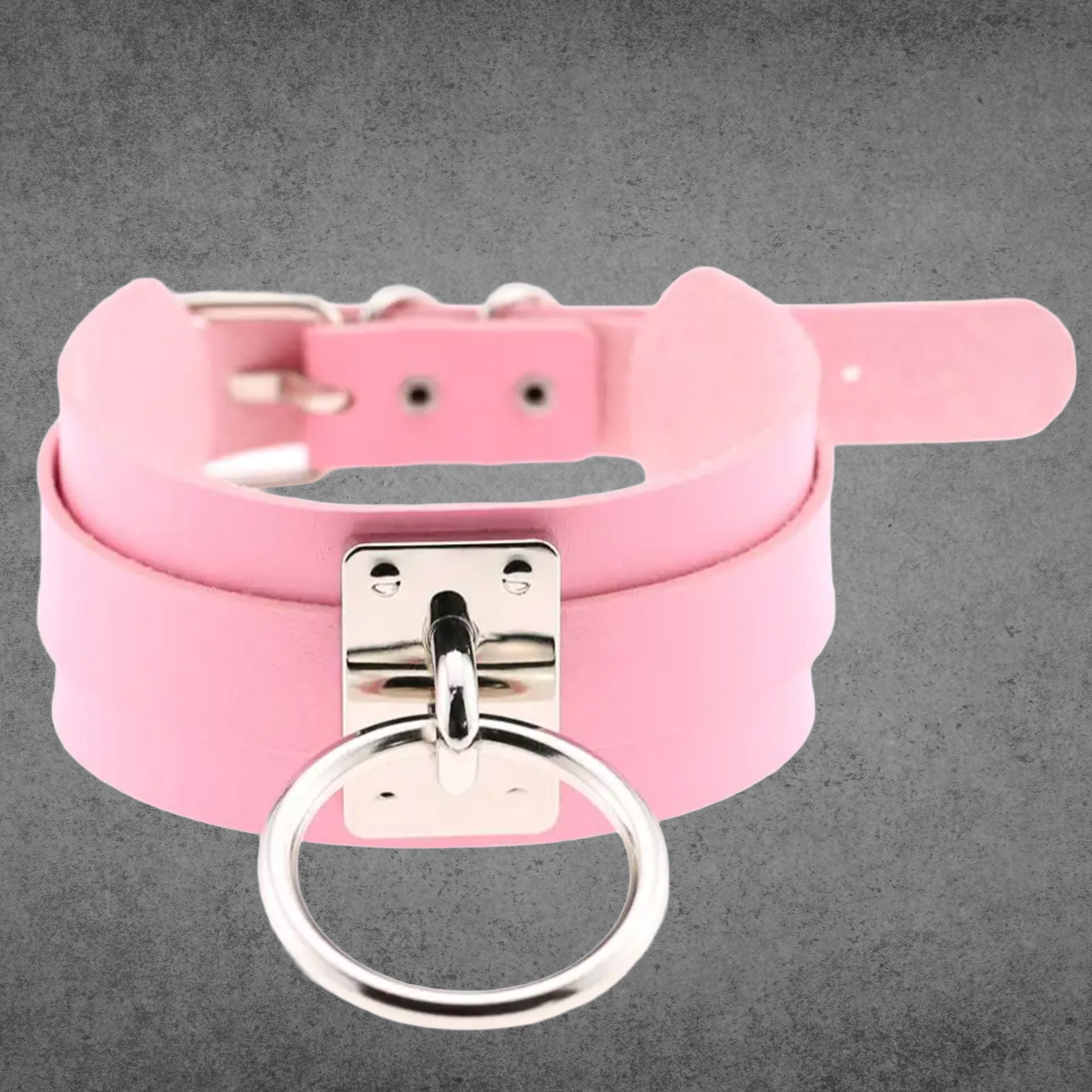 Baby pink faux leather collar with a large silver O-ring centrepiece