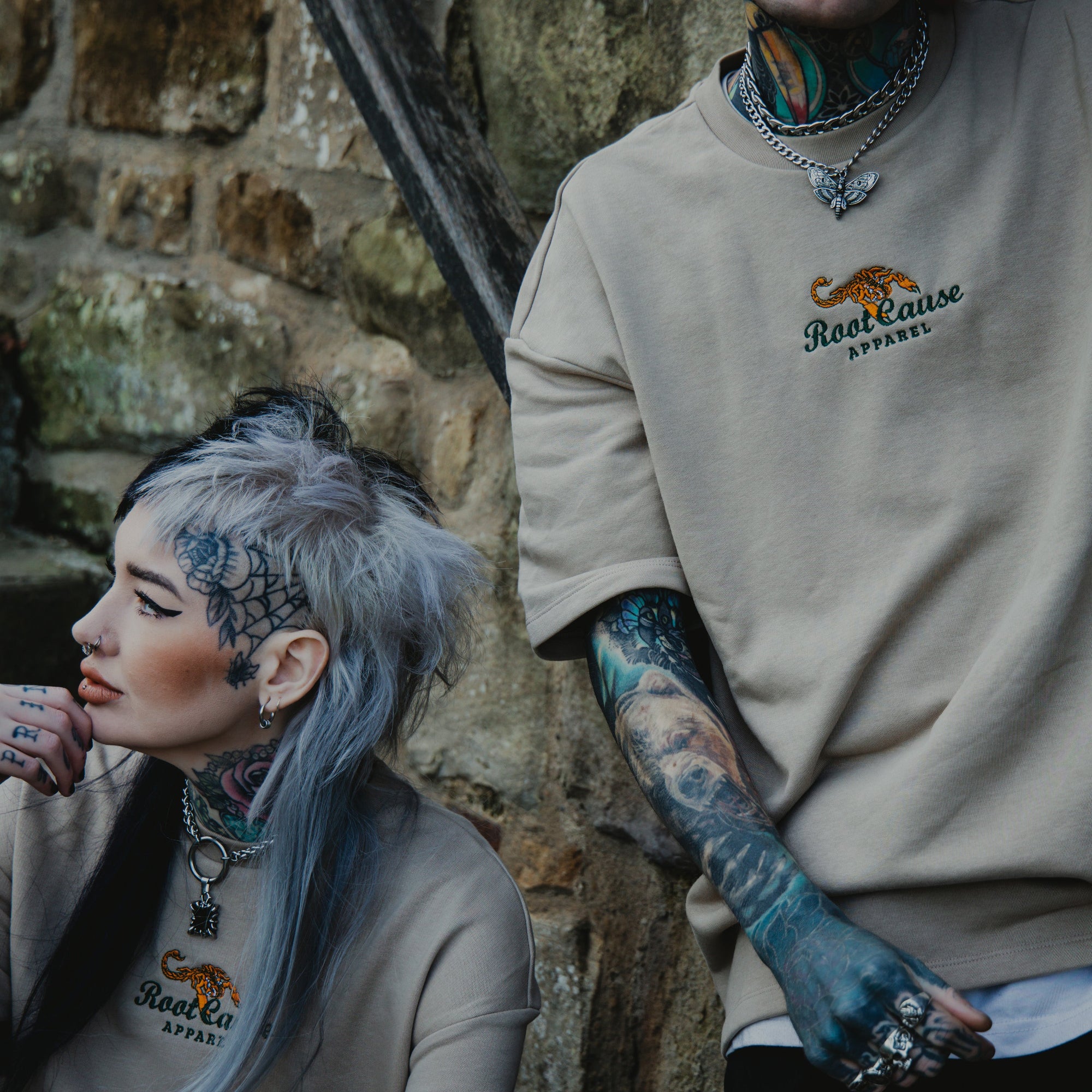 Female model wears a chunky O ring choker featuring an Onyx style pendant 