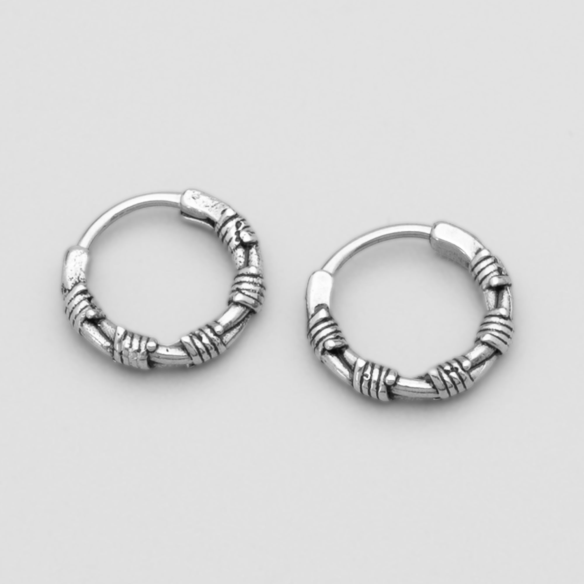 silver barbed wire hoop earrings