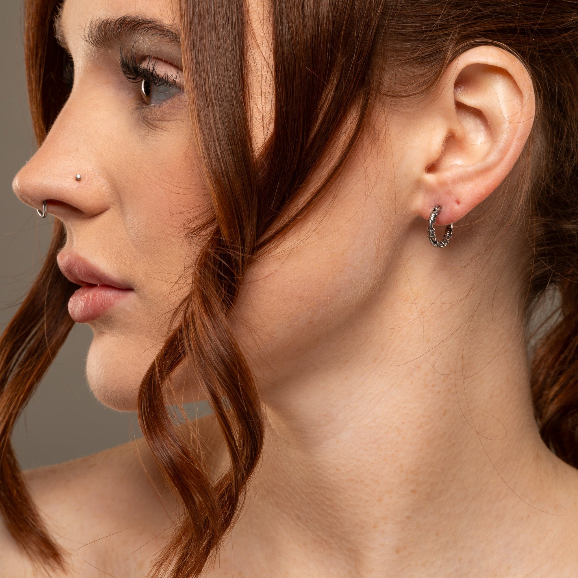 small barbed wire hoop earrings in silver 