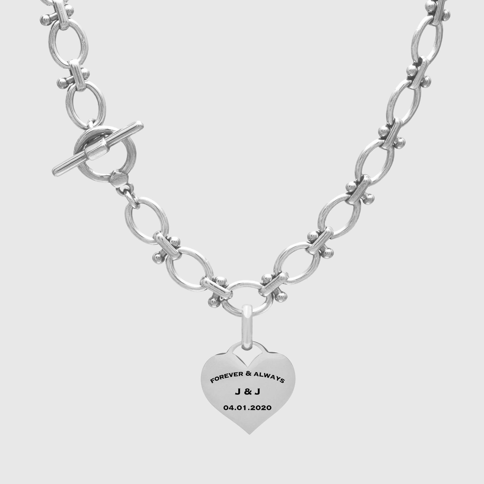engraved heart pendant on chunky chain necklace with toggle clasp 