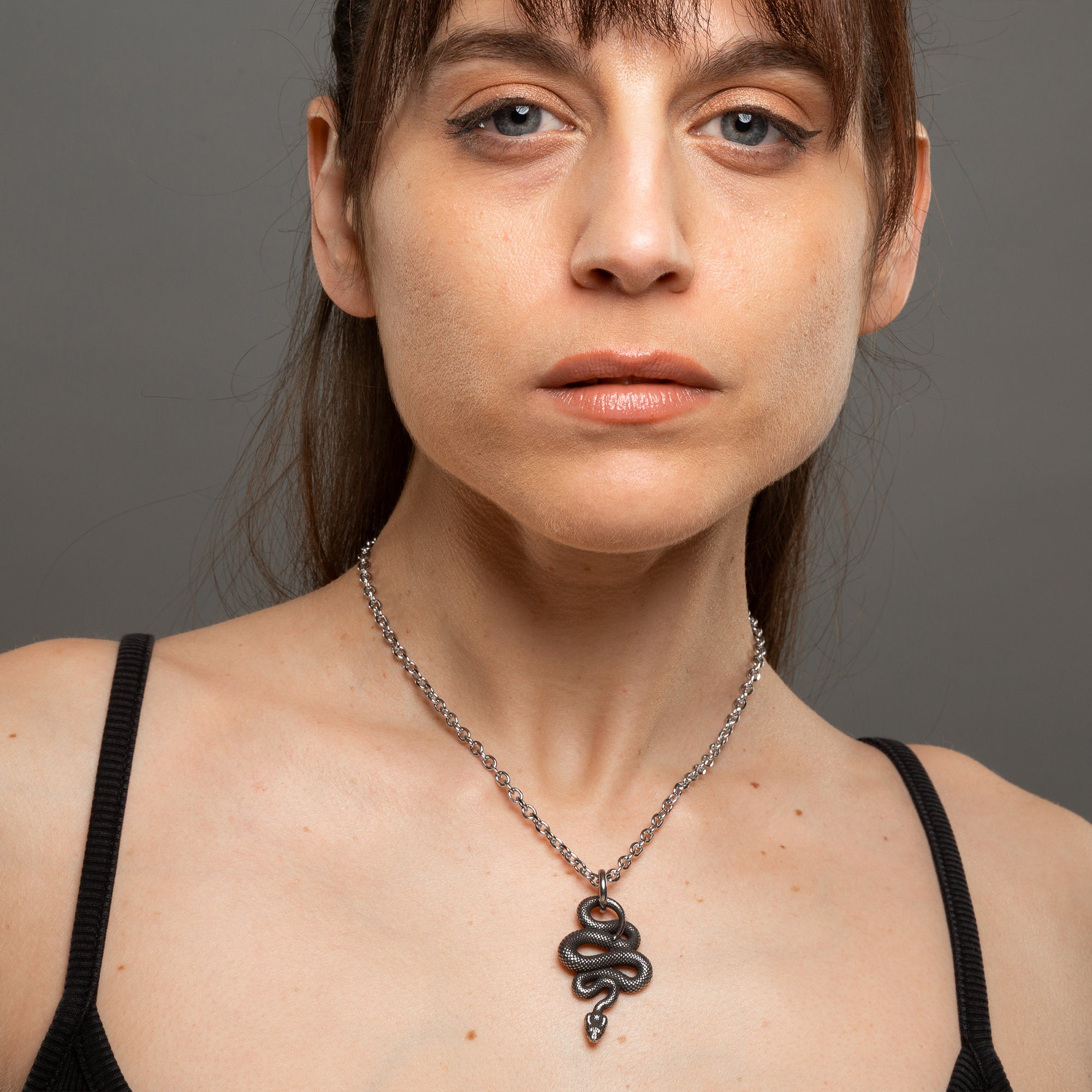 Silver Gothic coiled snake pendant on cable chain 