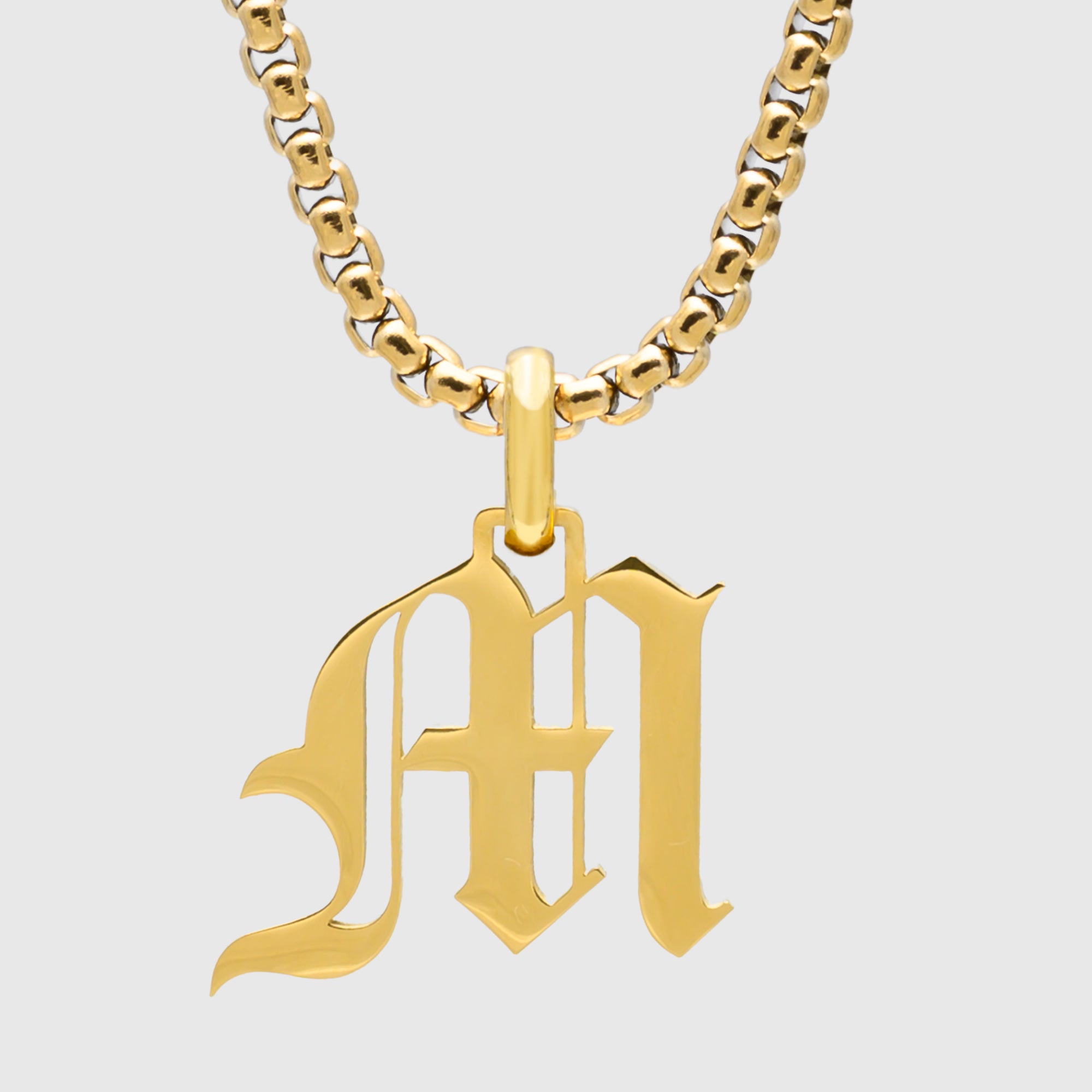 Large Gold Gothic style Initial letter M necklace in old english font 