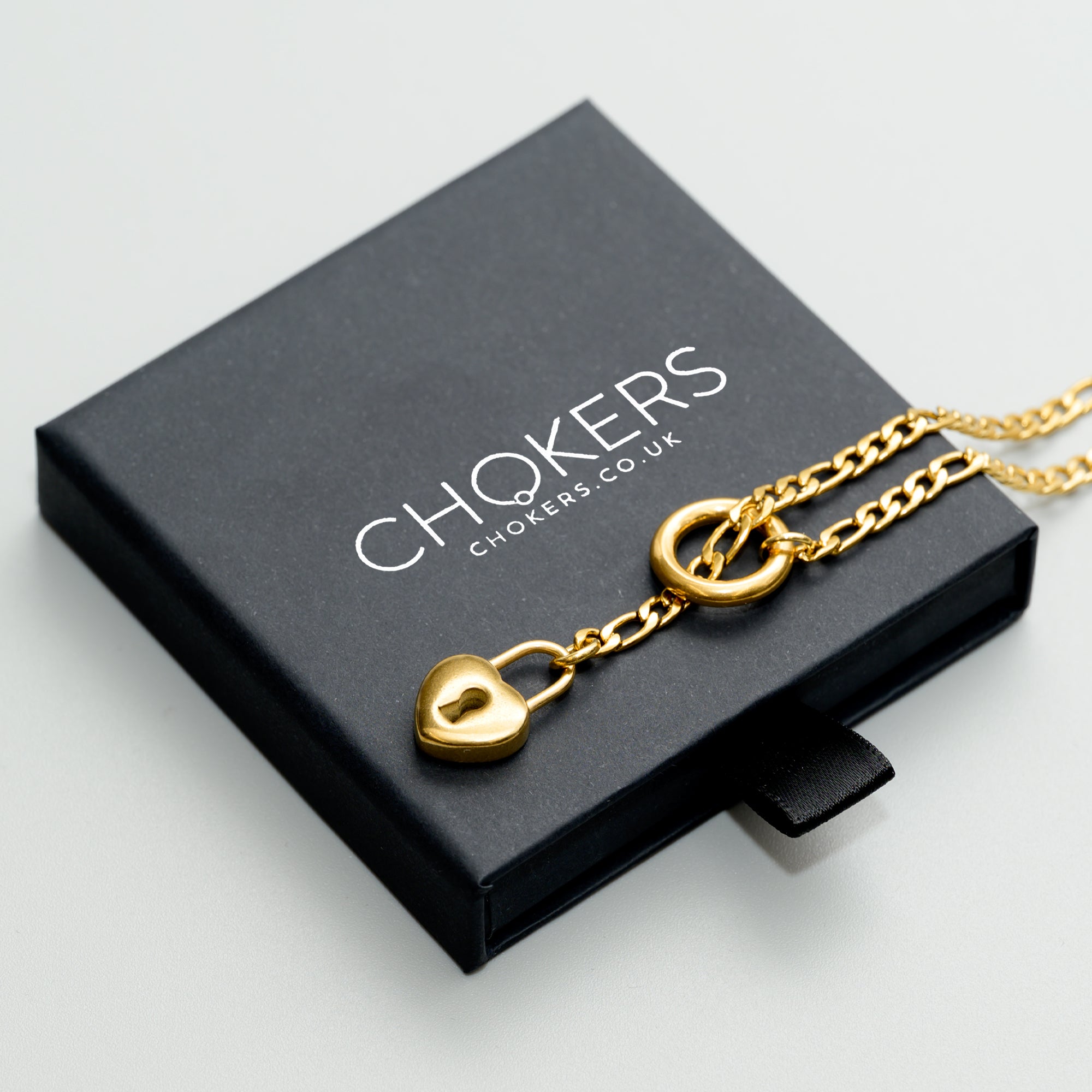 Gold slip chain necklace with a heart-shaped pendant made from 18k Gold plated stainless steel 