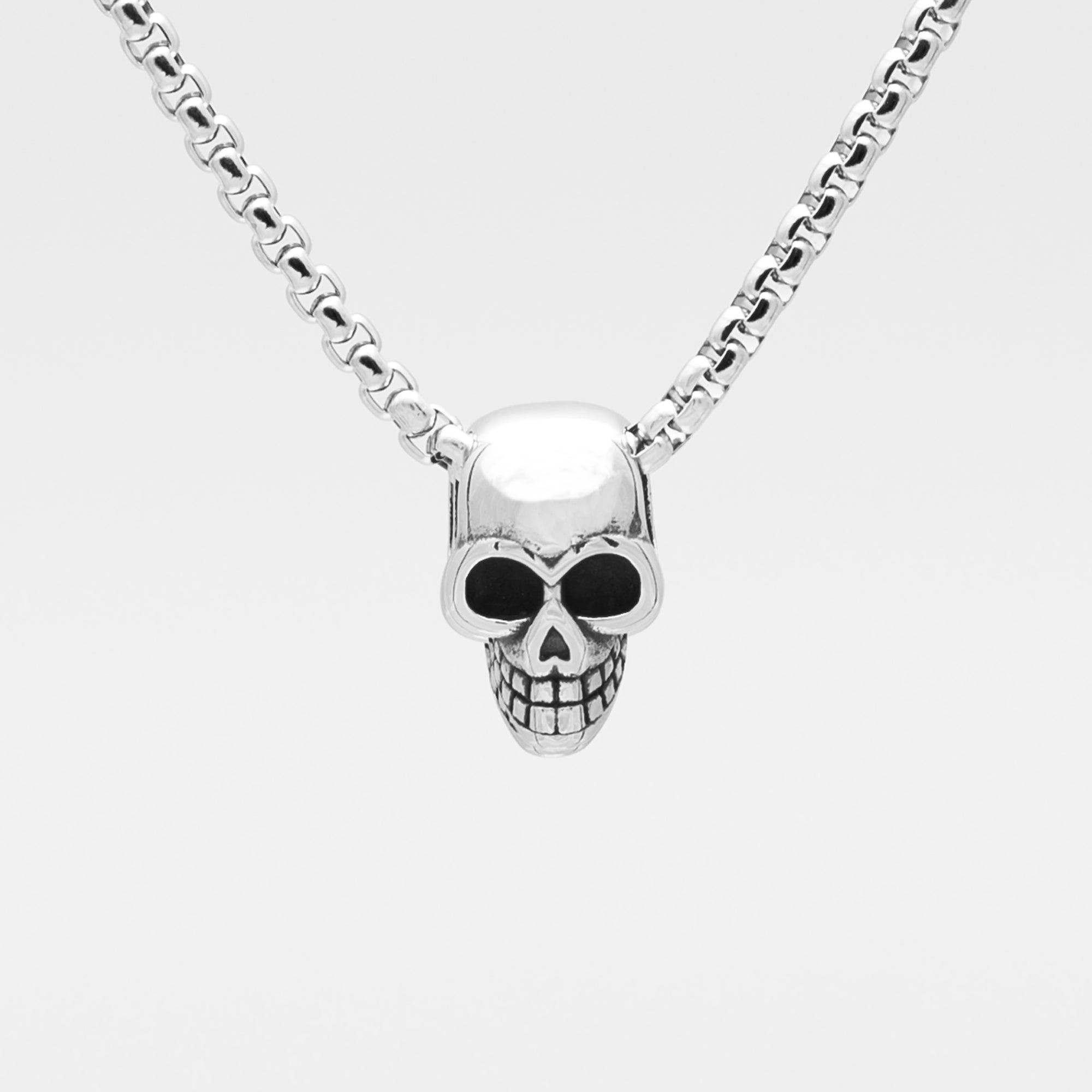 silver skull pendant on box chain necklace