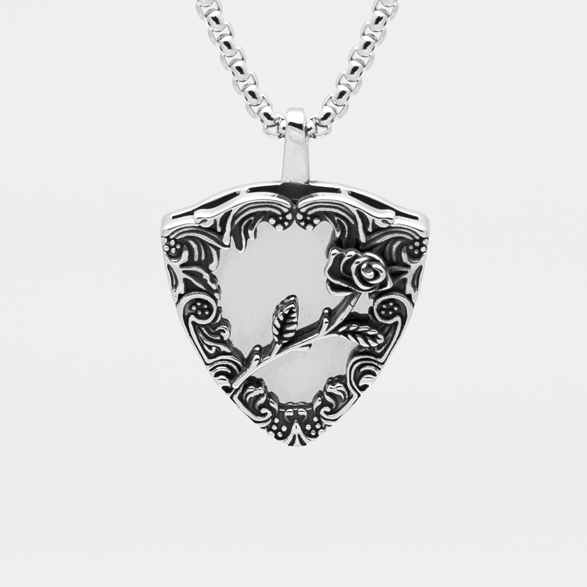 Silver Gothic mirror pendant featuring a rose floral design on a silver box chain neclace