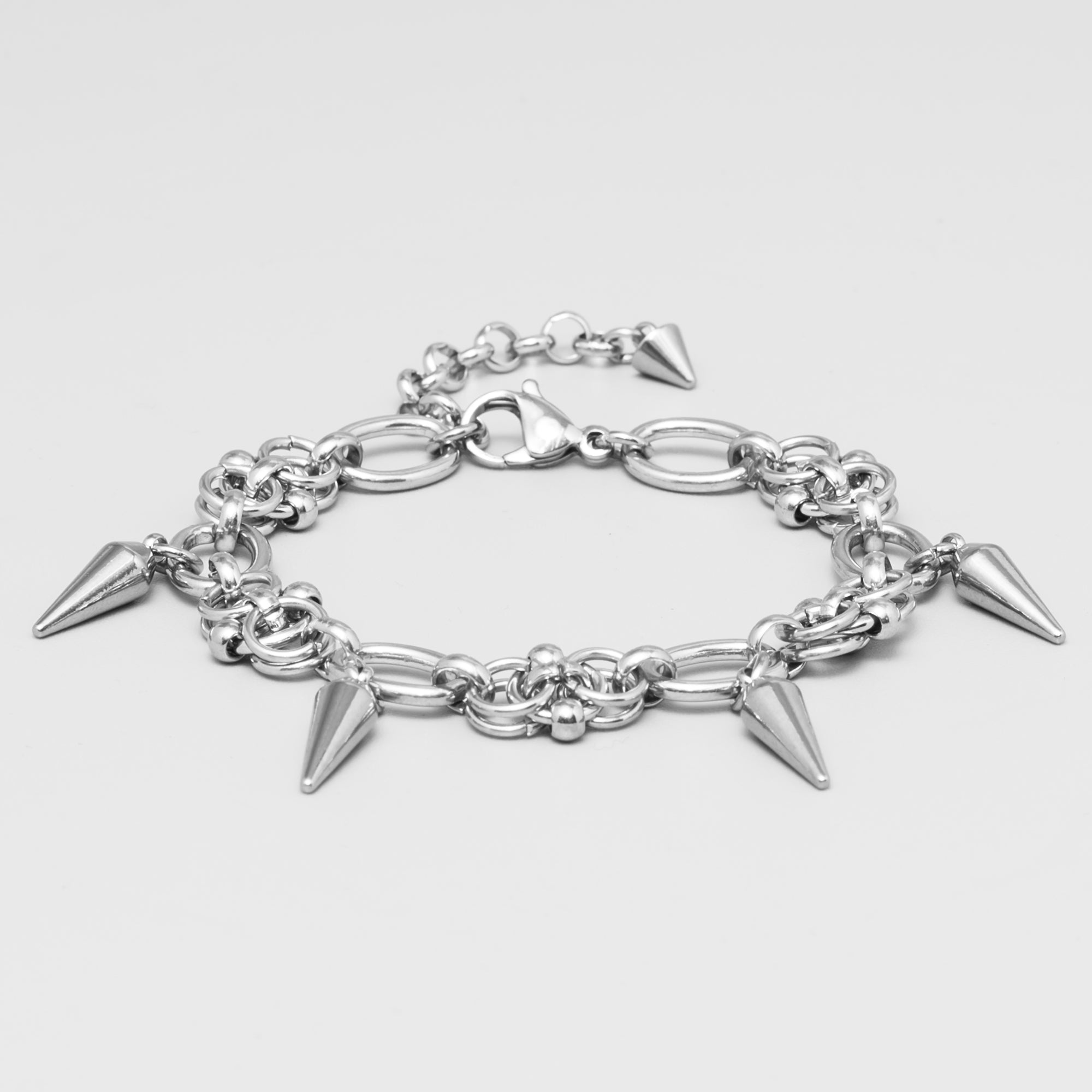 Silver chain bracelet with spike charms 