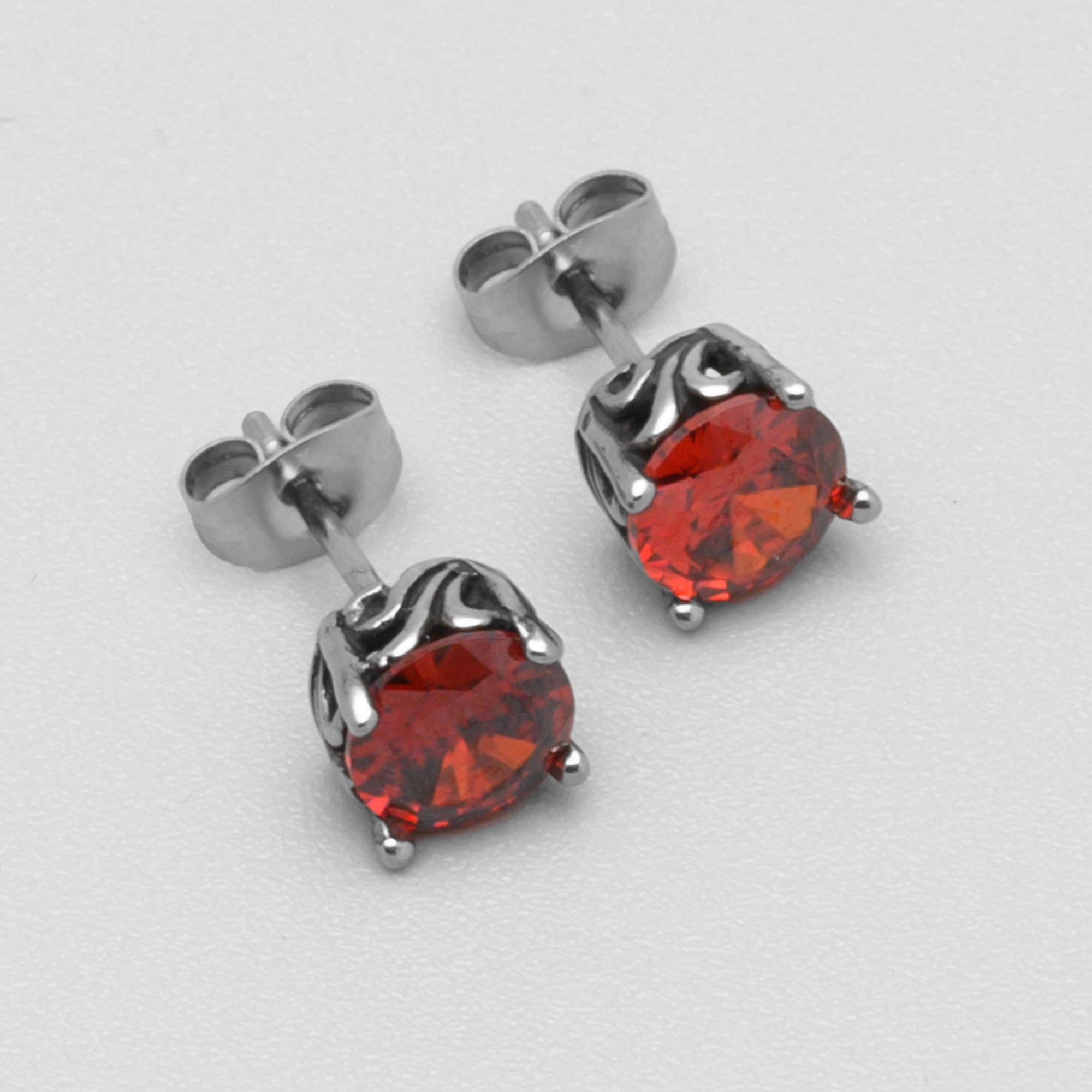 Close up of Ruby red gothic stud earrings 