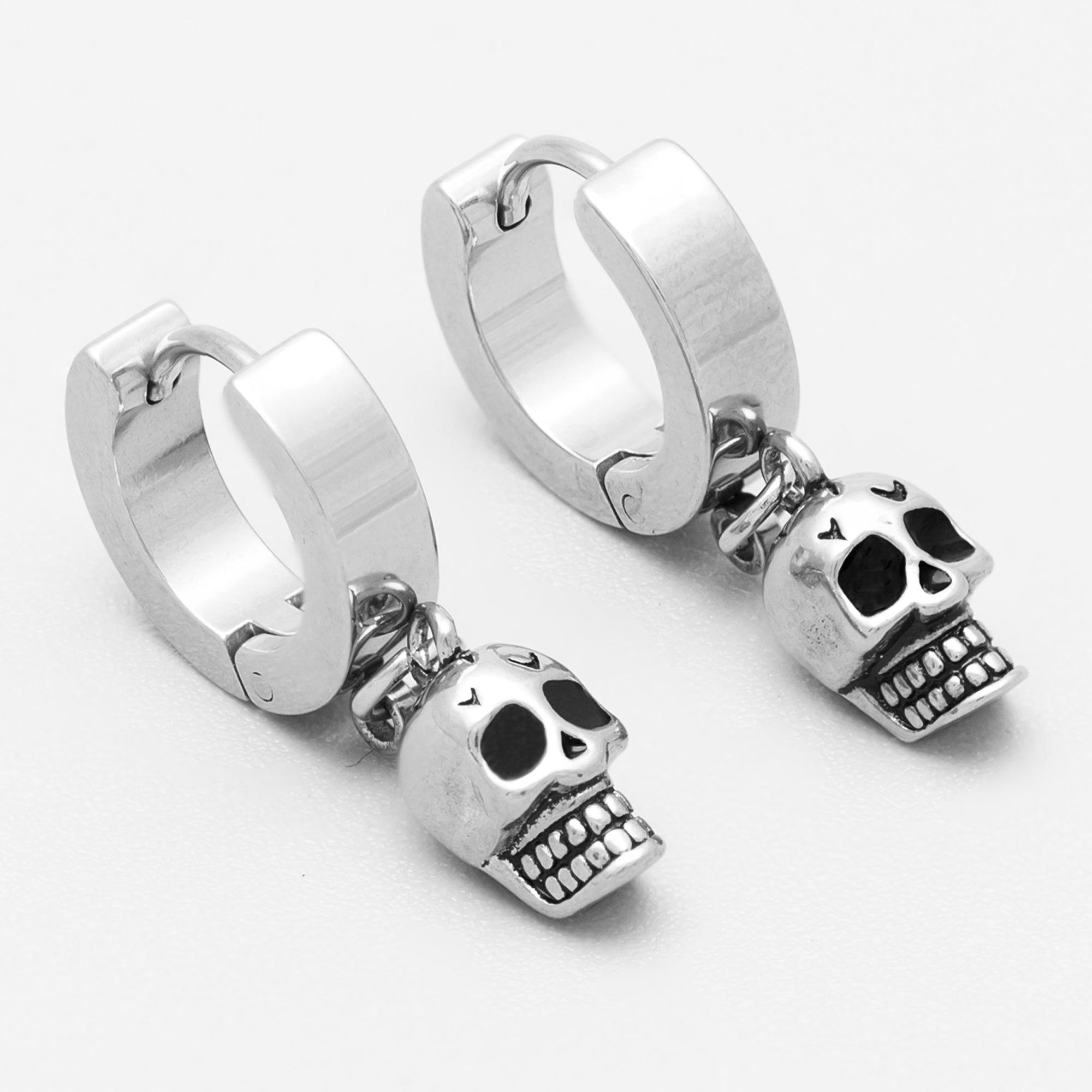 Silver Gothic skull huggie hoop earrings