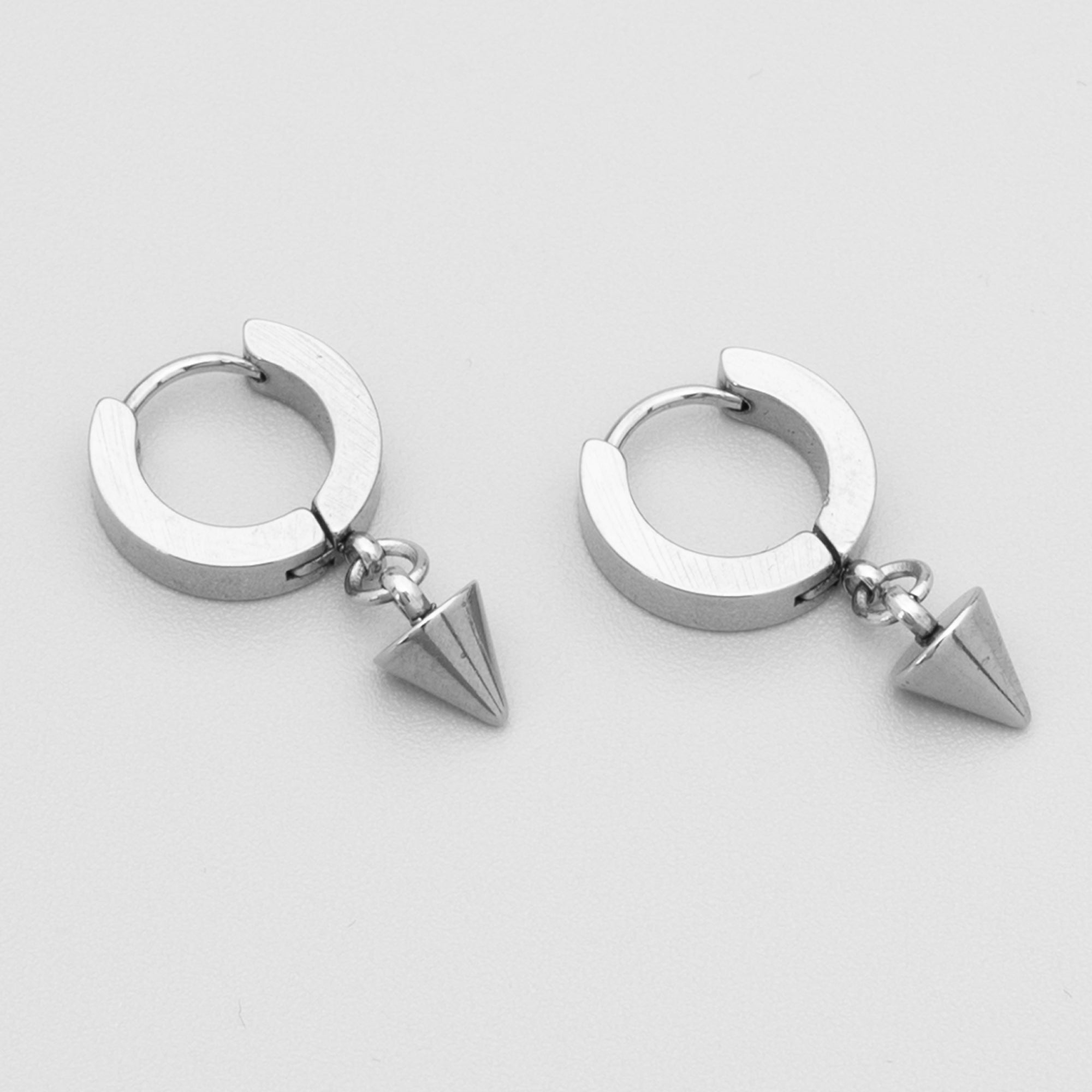 Small gothic spike huggie hoops in silver