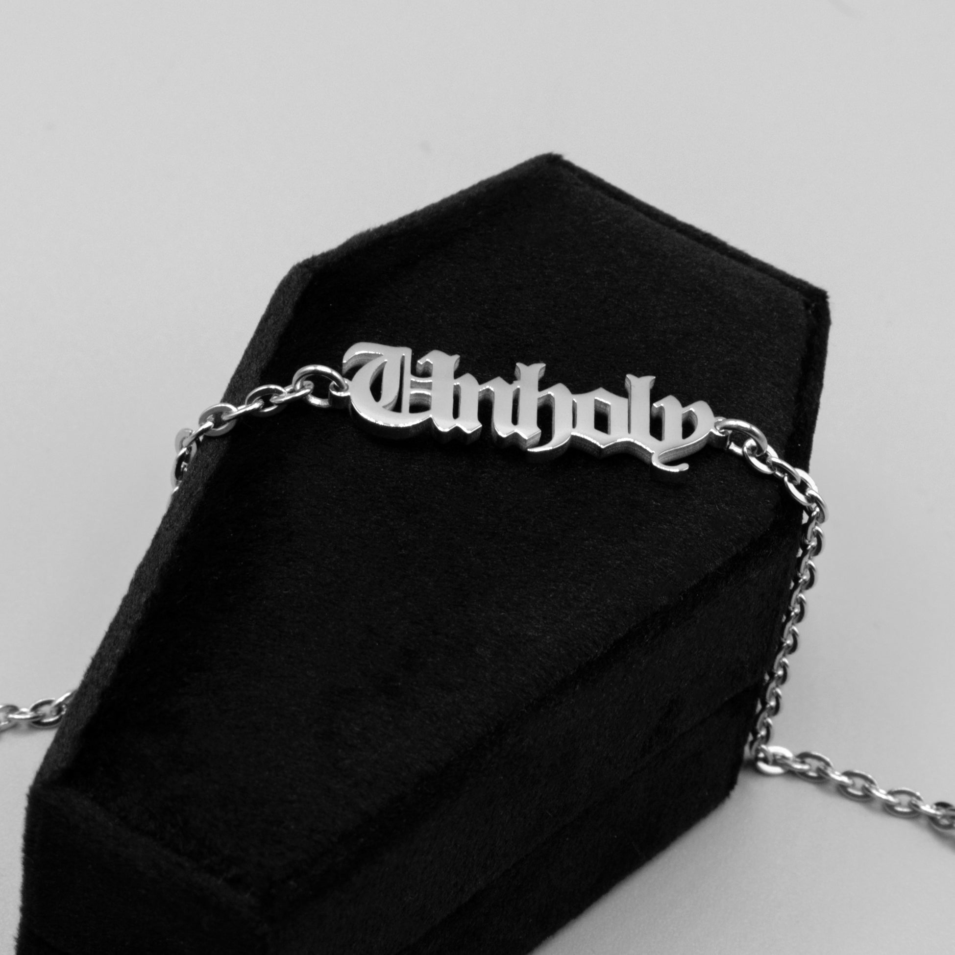 Unholy word choker in silver colour on dainty cable chain